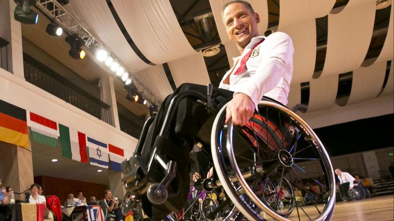 Man in wheelchair dancing