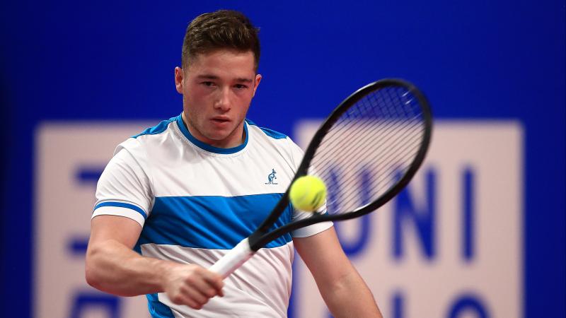 a male wheelchair tennis player