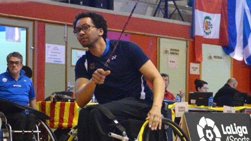 a male Para badminton player in action