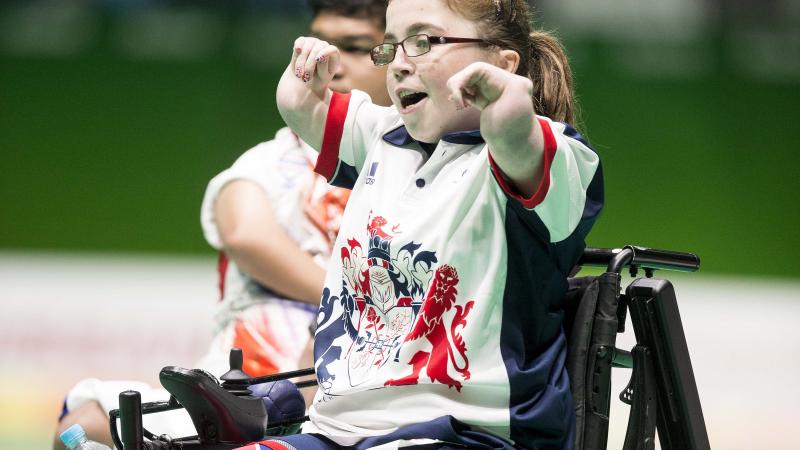 a female boccia player celebrates