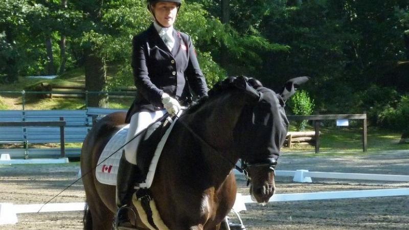 Woman riding a horse