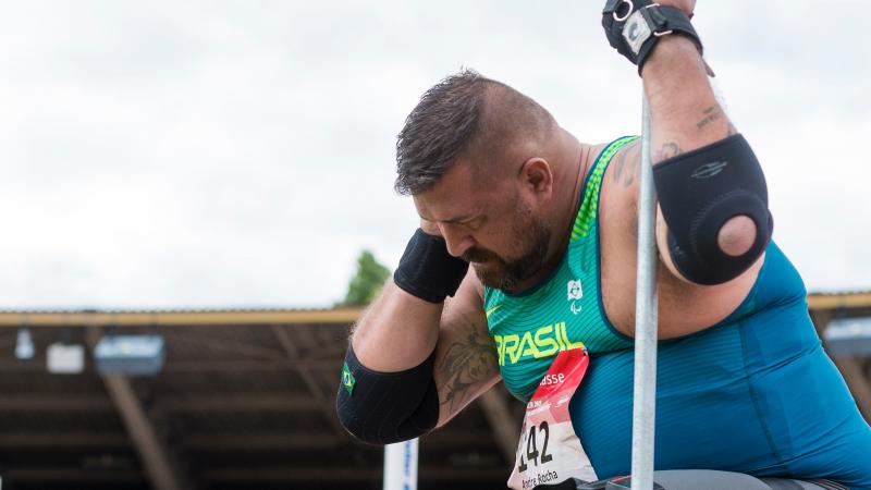 Brazilian shot putter, Andre Rocha, in the cirlce preparing to throw