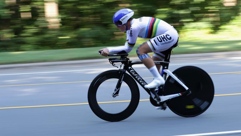 A female Para cyclist in action during a road race