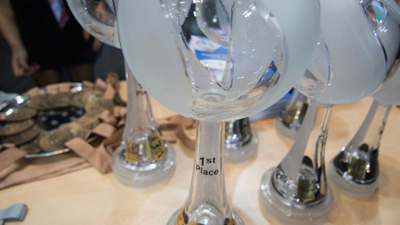 Glass-looking trophies for sitting volleyball World Championships medallists