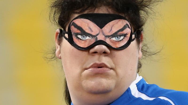 female Italian thrower Assunta Legnante wearing her eye mask before a throw