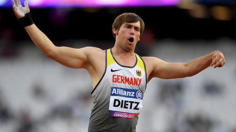 male Para athlete Sebastian Dietz reacts to throwing a shot put