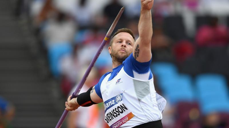 male Para athlete Helgi Sveinsson prepares to throw the javelin 