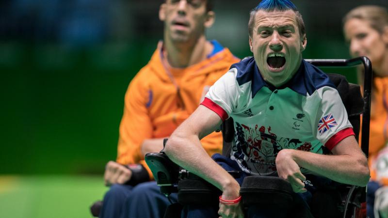 male boccia player David Smith celebrates after throwing the ball