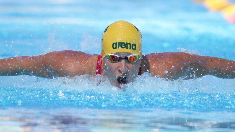 male Para swimmer Taylor Corry doing the butterfly stroke