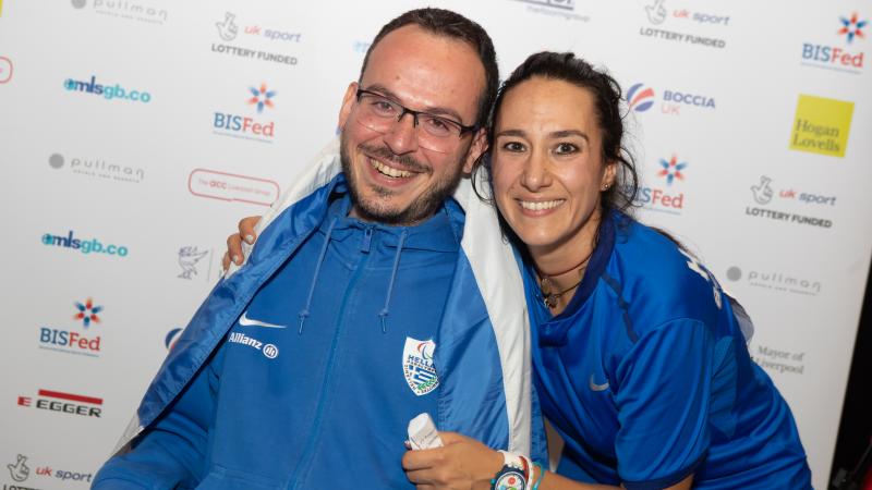 male boccia player Greg Polychronidis with wife and assistant Katerina 