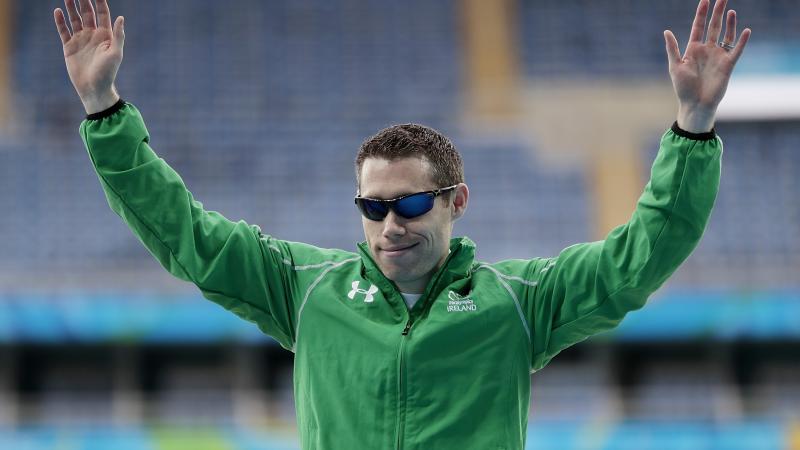 Para athlete Jason Smyth raises his arms