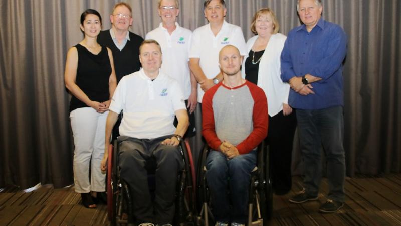 a group of people smiling including IWRF director Richard Allcroft