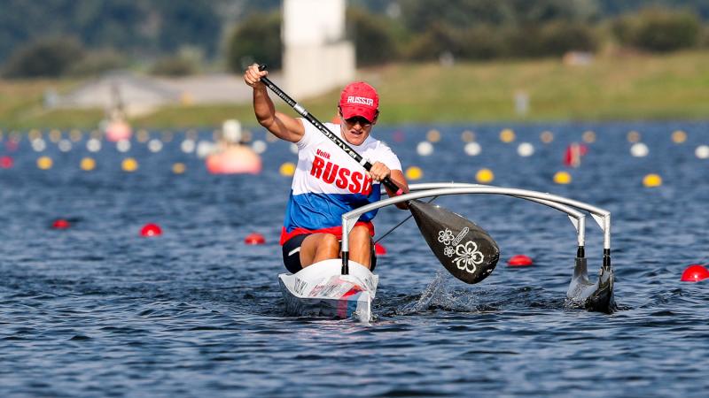 female Para canoeist Larisa Volik takes a stroke