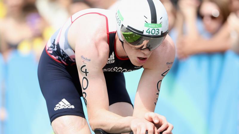 George Peasgood male Para triathlete George Peasgood rides on a bike