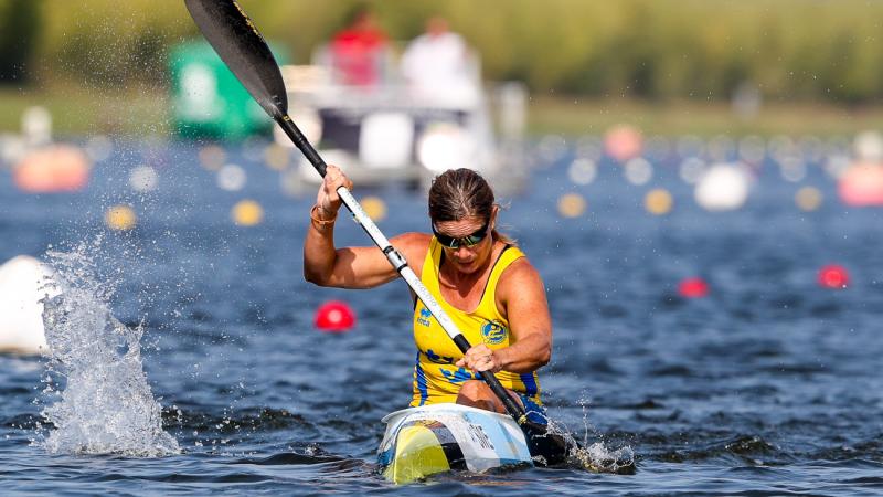 female Para canoeist Helene Ripa paddles in her boat