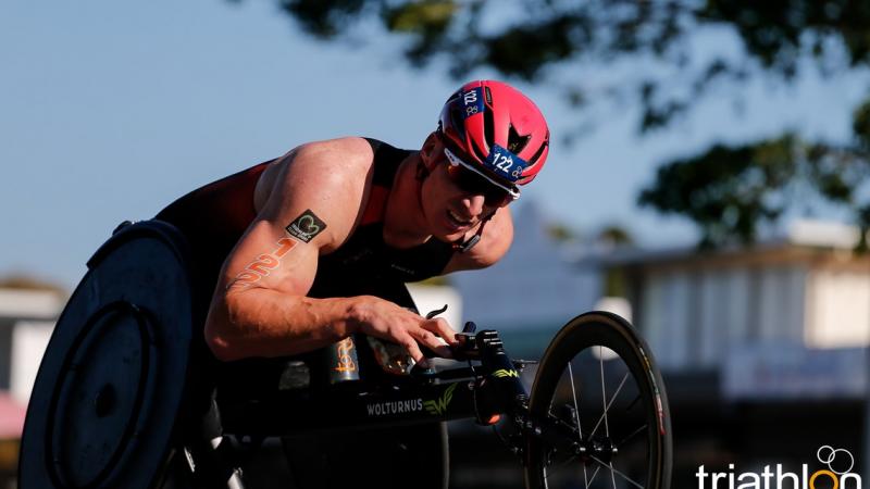 A man in a race wheelchair