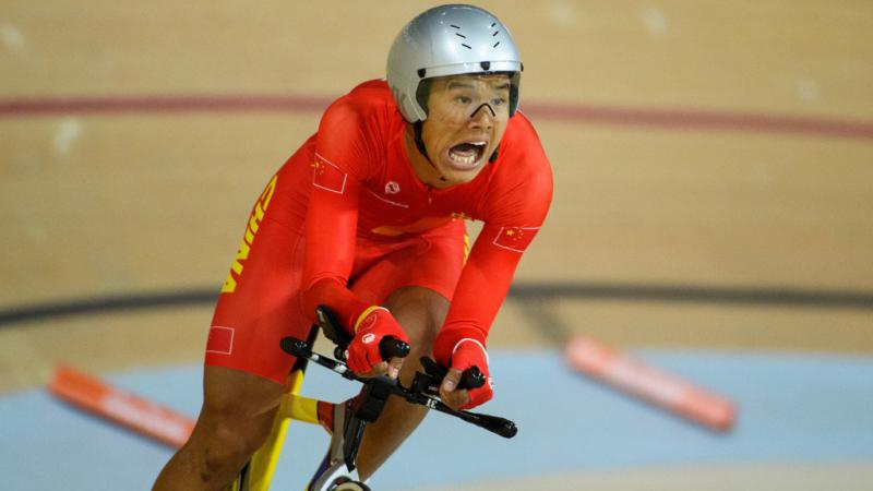 male Para cyclist Li Zhangyu goes round the bend on his bike