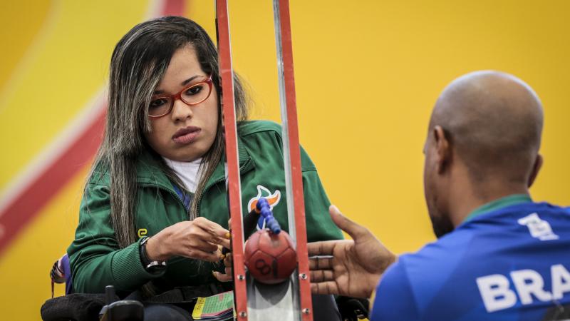 female boccia player Evelyn de Oliveira prepares to play a ball