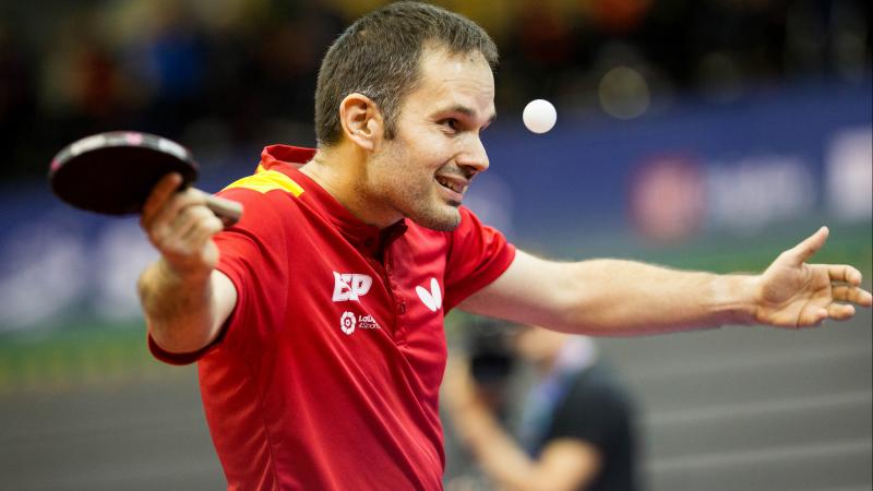 Man playing Para table tennis