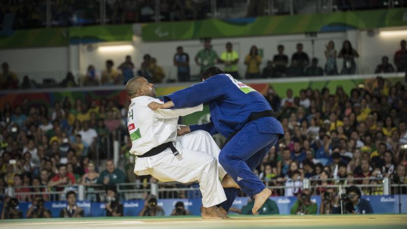 two judoka fighting on the mat