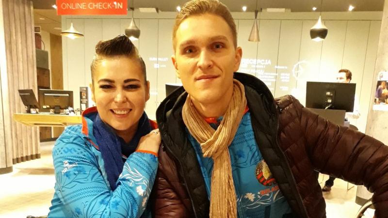 female Para dancer Hanna Harchakova and male Para dancer Roman Usmanov sitting together