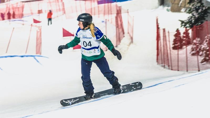 Woman snowboarding