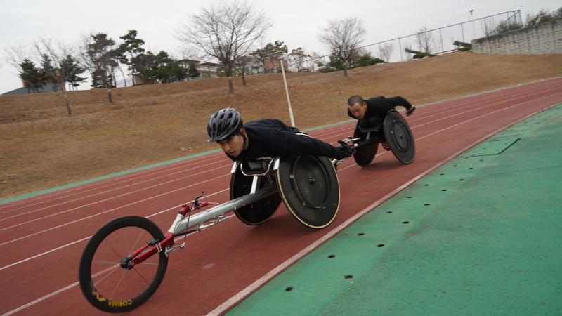 two track and field athletes training at the Korean Paralympic Training Centre in Icheon