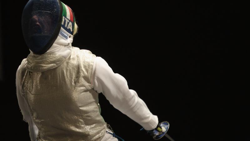 female wheelchair fencer Beatrice Vio screams through her helmet after winning a point