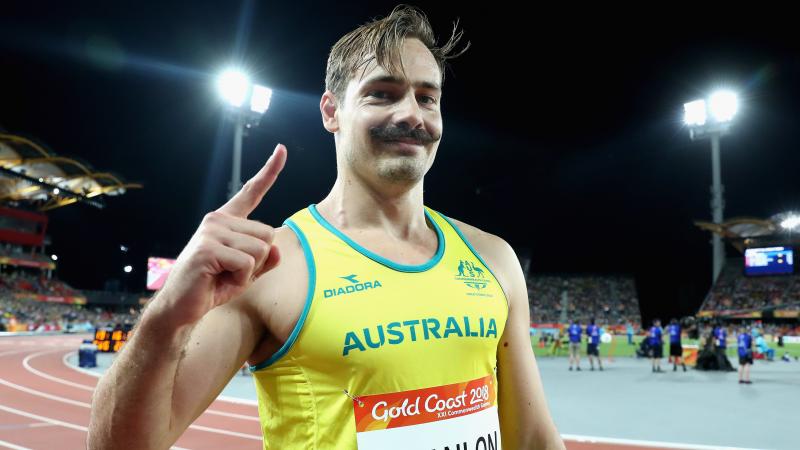 male Para sprinter Evan O'Hanlon gives a thumbs up to the camera