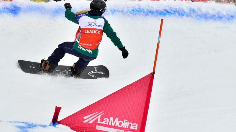 female Para snowboarder Lisa Buschoten on the slope