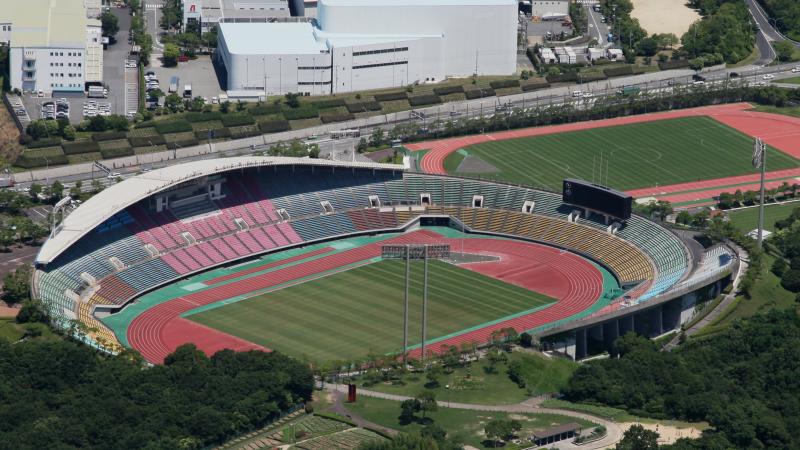 An aerial view of a stadium with an athletics track