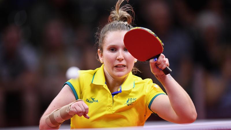 female Para table tennis player Melissa Tapper plays a forehand
