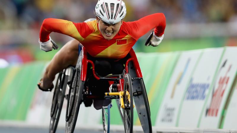 female wheelchair racer Hongzhuan Zhou on the track