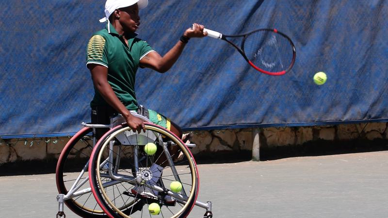 South African wheelchair tennis player Kgothatso Montjane ready to hit a backhand 