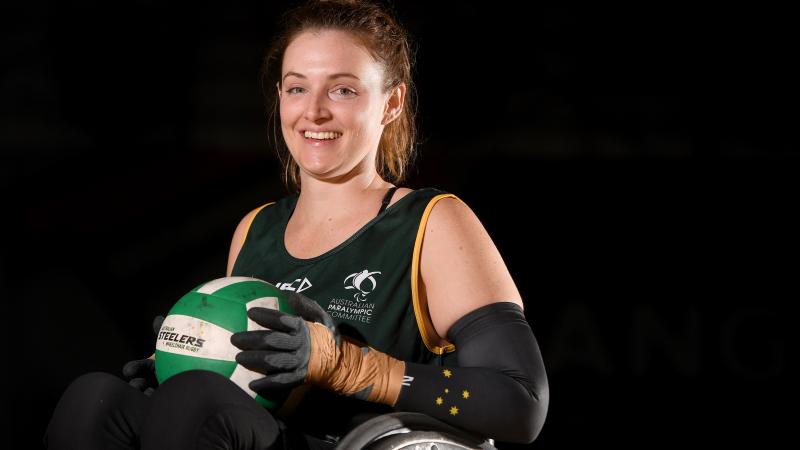 female wheelchair rugby player Shae Graham holding a ball