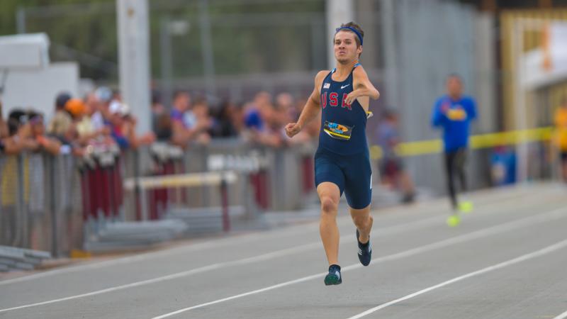 US sprinter on the track running towards the finish line