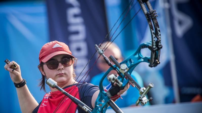 Jessica Stretton wearing glasses and a cap while competing