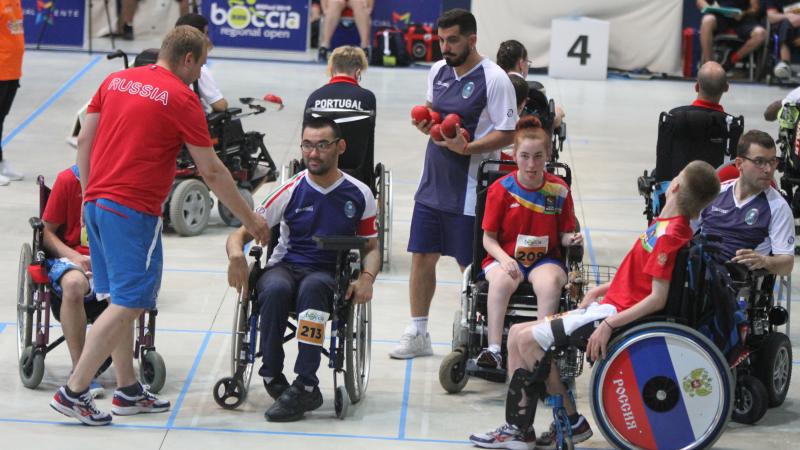 Russian boccia players with their coach