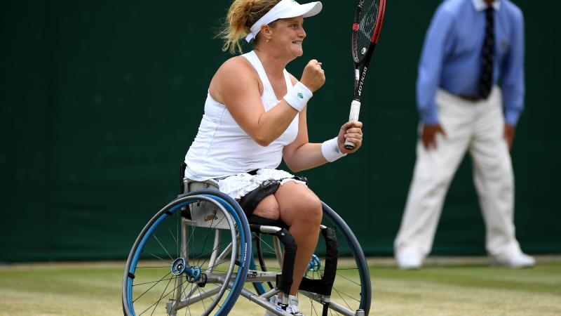 Aniek van Koot celebrates with his close fists after winning Wimbledon