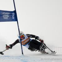 A picture of a woman skiing on the slopes