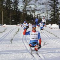 A picture of a man celebrating after crosses the finish line