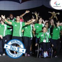 a group of athletes parading at the Opening Ceremony