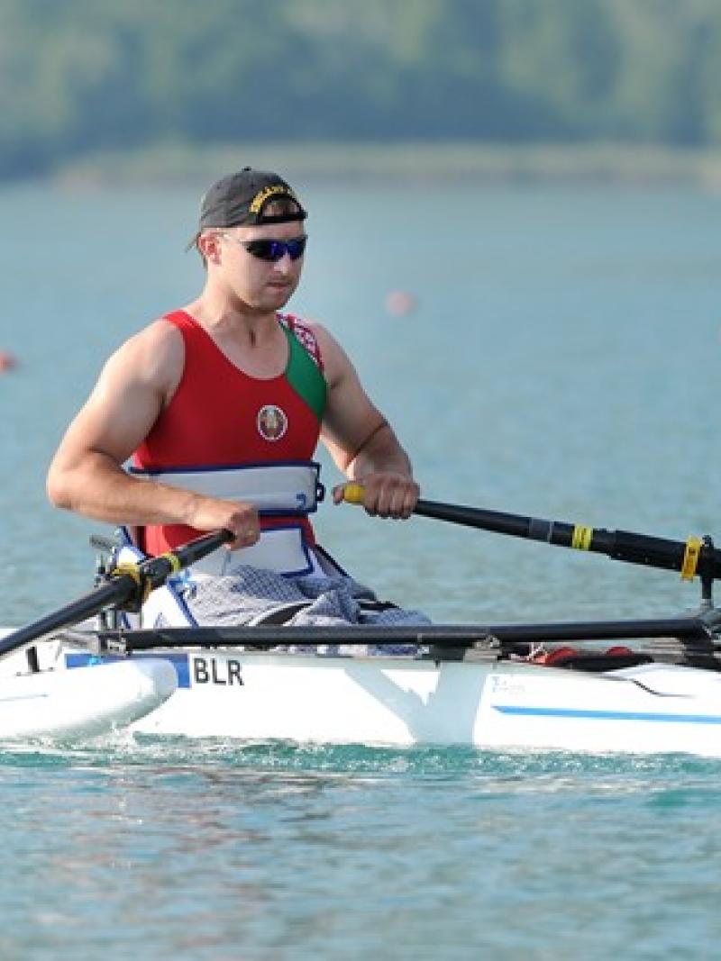 Man sits in rowing boat