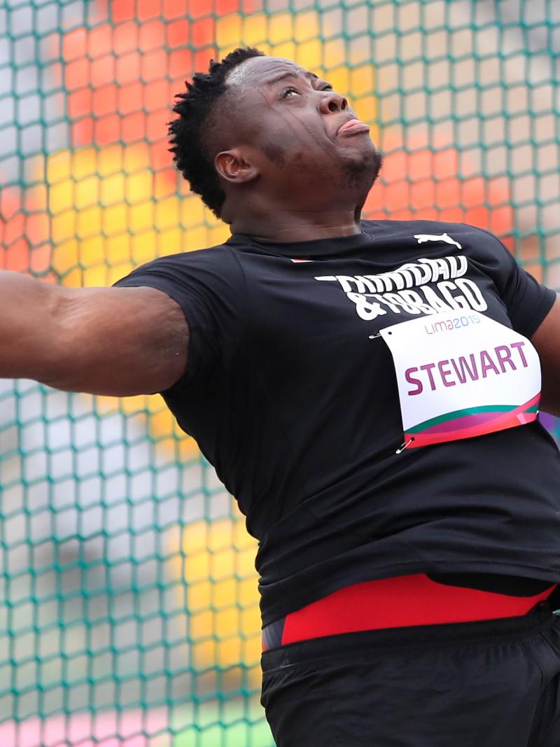 a male Para athlete throws a discus