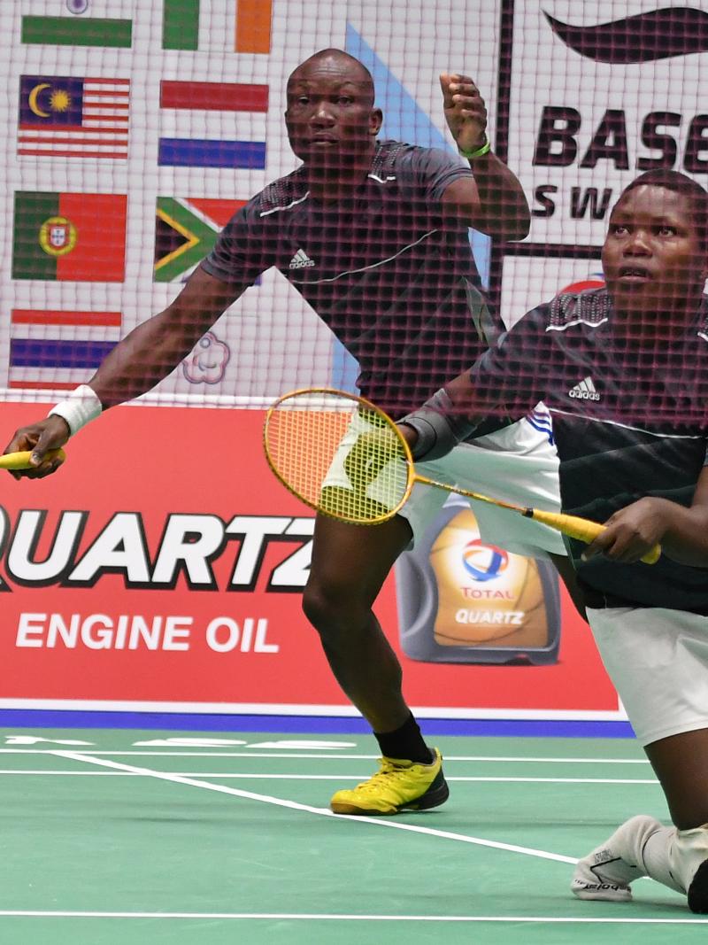 Doubles Ugandan badminton team on the court
