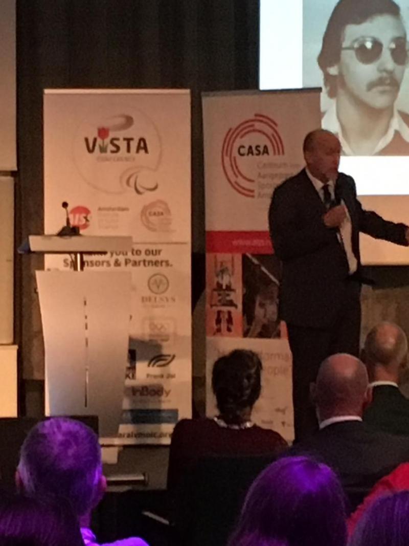 Man gives presentation at conference