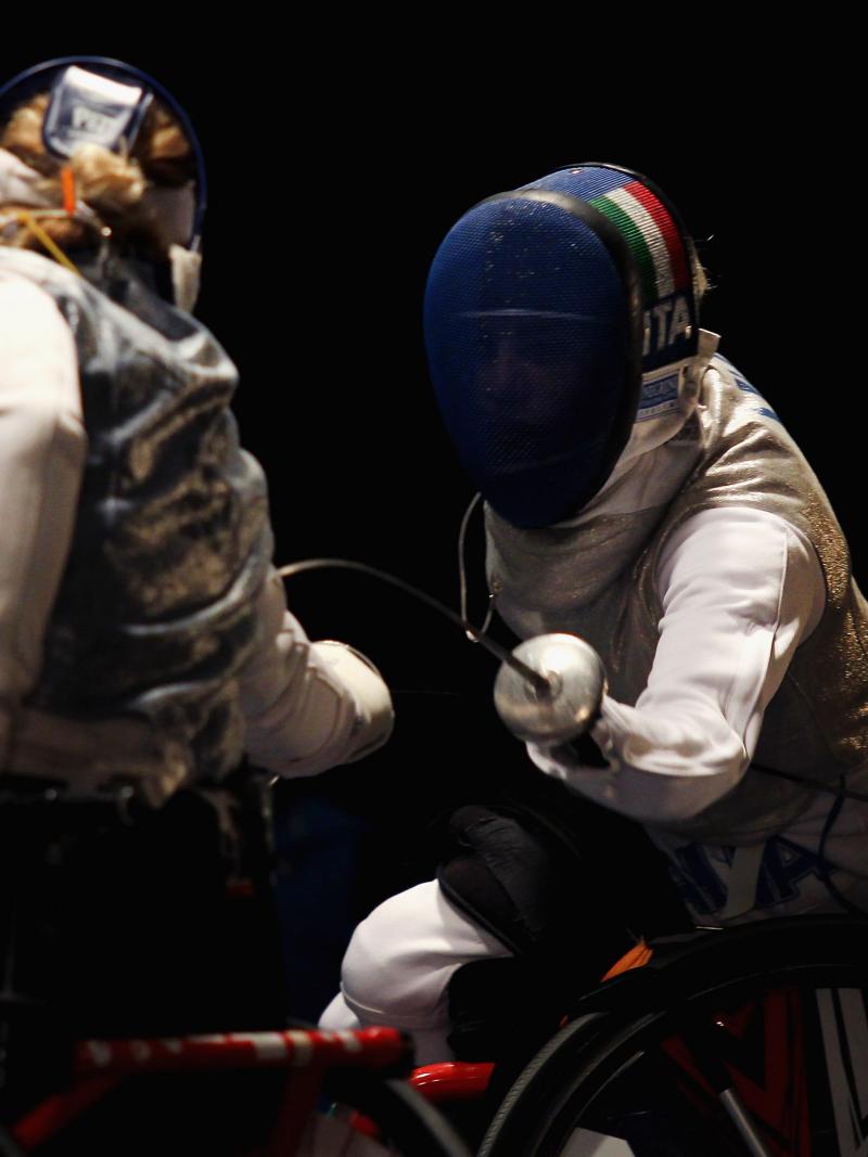 Two women fencing