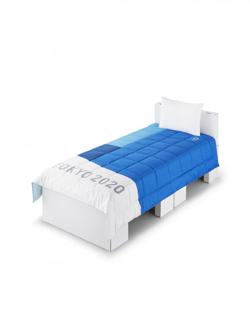 Image of a bed with sheets and pillow