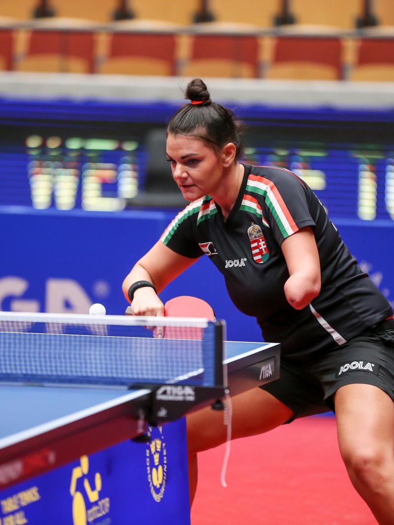 Hungarian table tennis player with left arm amputation returns a shot