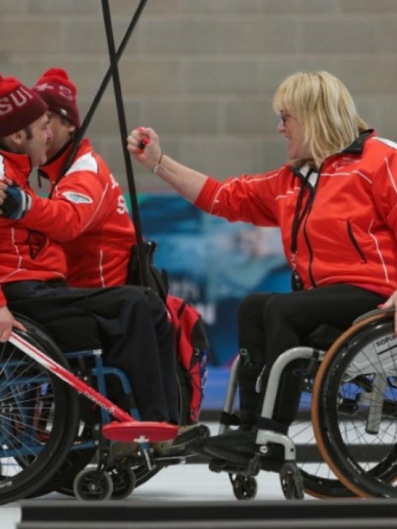 JUBILANT ALL: Hans Burgener, Francoise Jaquerod and Eric Decorvet celebrate Switzerland's win at Stirling 2019